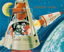An illustrated stamp featuring Laika in Sputnik II orbiting the earth.