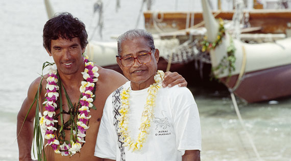 Nainoa Thompson of the Polynesian Voyaging Society stands next to Micronesian wayfinder, Mau Piailug.