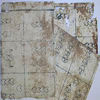 Three uncut sheets playing cards made with wood blocks that were found in Johann Spremberger's Ein kurtzer und gründlicher Bericht ... wider die pestilentischen Kranckheit