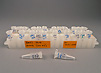 White plastic test tubes with caps in white plastic test tube holder.  Tubes and holder have labels written on them in ink.