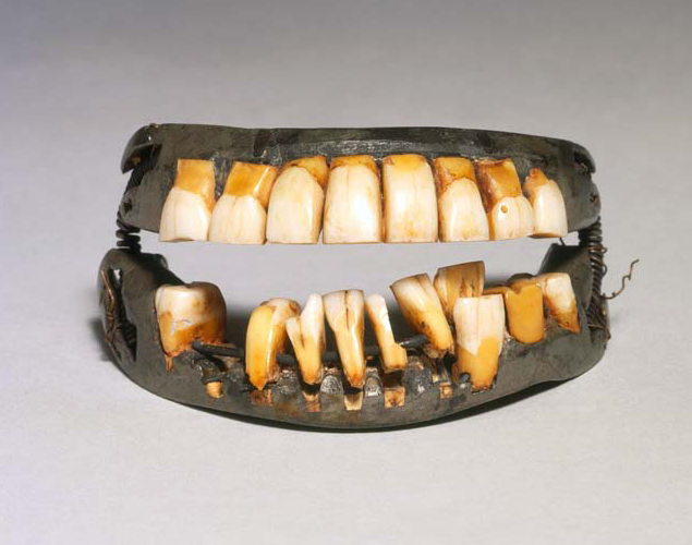 Front view of George Washington's teeth open.