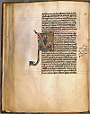 F. 19 verso from Manuscript E 78. A hand written page, with an illustrated M in the left side of the middle of the page. There are three tonsured figures, the center one holds a book open while the ones to the left and right are counting off fingers.