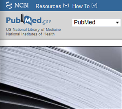 PubMed home page with a close-up of pages in a book.