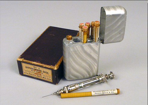 Photograph of a syringe and case of morphine.
