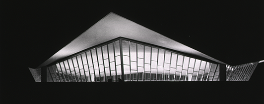 The roof of the National Library of Medicine at night.