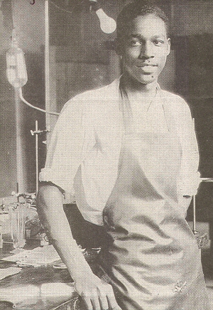 Portrait of a Black male in a laboratory.