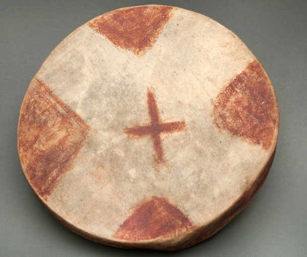 Color image of a round, flat, handmade drum.
