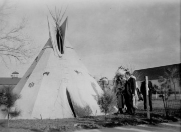 Bureau of Indian Affairs Commissioner John Collier and chiefs at tipi, 1934