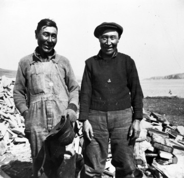 Evacuees Cornelias Kudrin, right and George Borenen, left from Kaskega village, Unalaska Island, 194