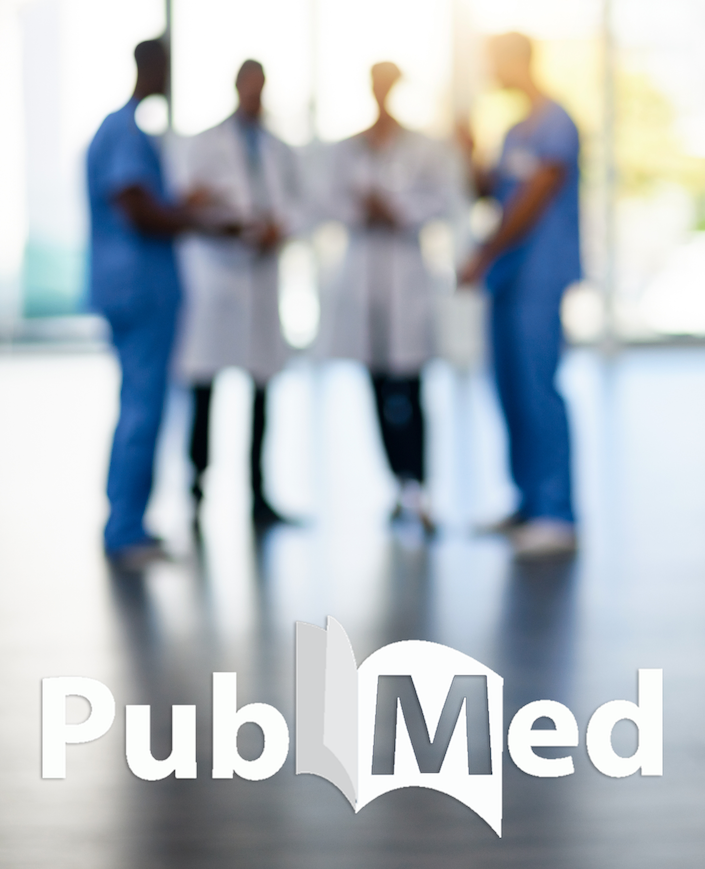 Defocused group of health care professionals with PubMed logo