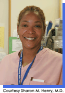 Portrait style image of a woman in pink medical scrubs.  Courtesy Sharon M. Henry, M.D.