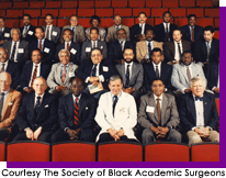 Group of men and one woman seated in rows of an auditorium. Courtesy The Society of Black Academic Surgeons