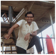 Dr. Mizanur Rahman stands on Matlab barge