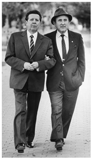 Dr. Evgueni Chazov and Dr. Bernard Lown walking arm-in-arm down outdoor path