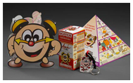 Agita São Paulo promotional materials including exercise prescription box, mascot clock keychain, mascot clock card, and exercise pyramid