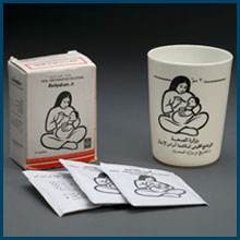 Cup and packets of oral rehydration solution 