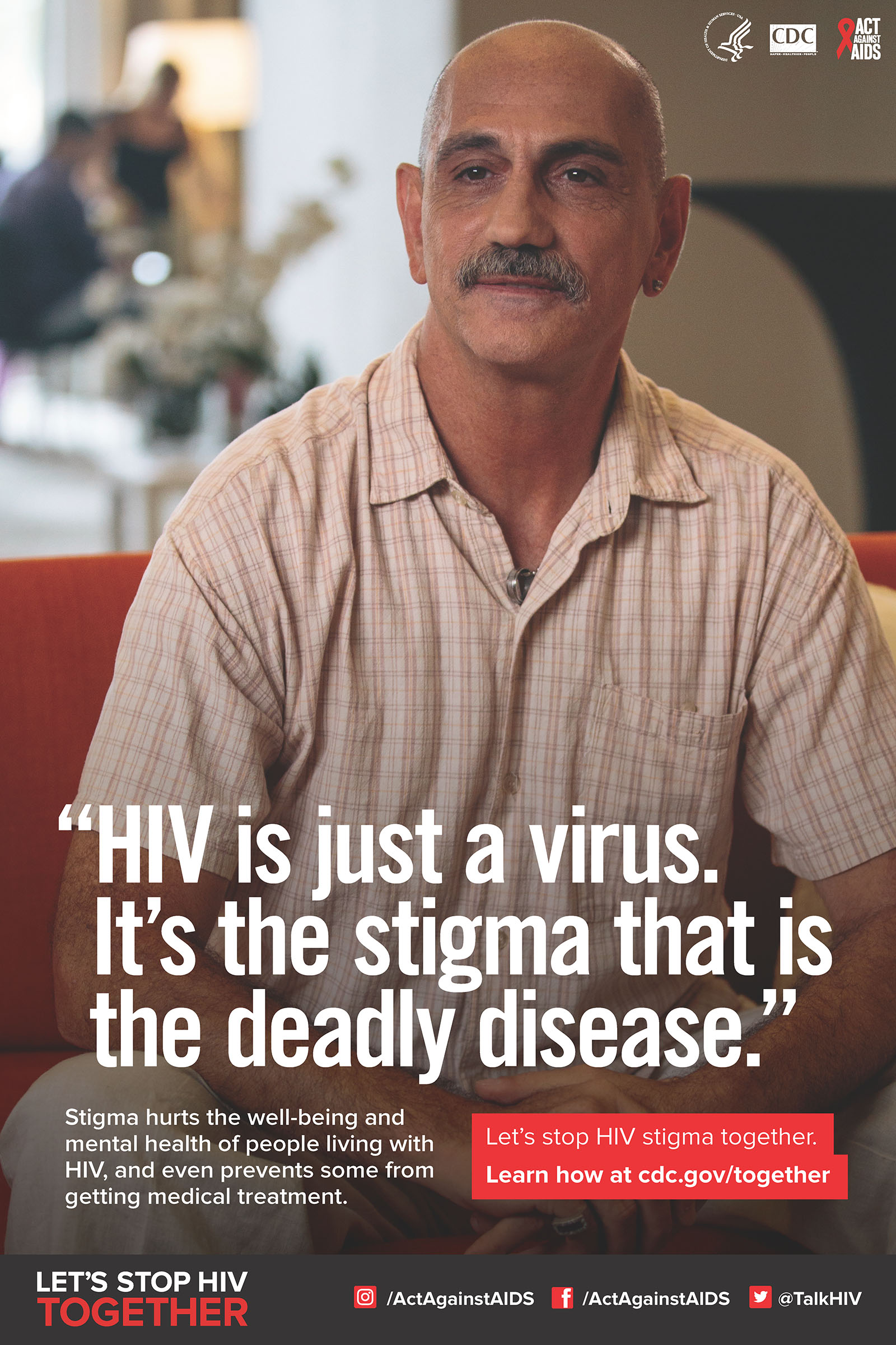 A seated man with a quote below that says, HIV is just a virus. It's the stigma that is the deadly disease. 