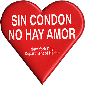 A red button shaped like a heart with the words Sin Condom No Hay Amor, New York City Department of Health written in white lettering.