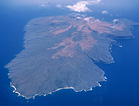Color photograph of an aerial image of Kanaloa Kahoâ€˜olawe, a Hawaiian island.