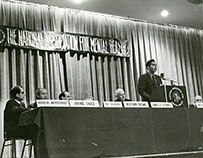 A white man at a podium giving a speech.