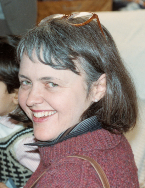 A 20th century photograph of a white woman with two children