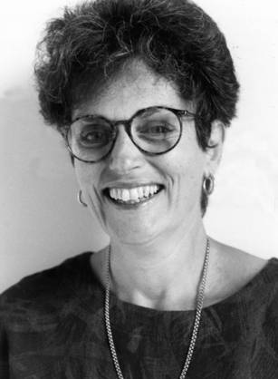 Dr. Elizabeth Karlin, a White woman, poses for a portrait