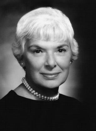 Dr. Edithe J. Levit, a White woman with White hair wearing pearls for her portrait.