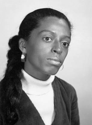Dr. Barbara Ross–Lee, an African American woman in a turtleneck posing for her portrait.