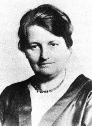 Dr. Vivia Belle Appleton, a White woman in a silk blouse posing for her portrait.