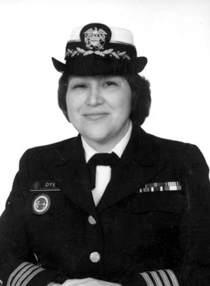 Dr. Sara K. Dye, an American Indian woman posing in a decorated uniform and hat for her portrait.