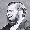 Image of a seated Thomas Henry Huxley (1825-1895). Image B011455 in the Images from the History of Medicine (IHM) collection.