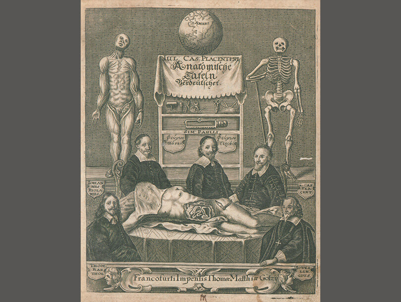 Frontispiece illustration of five men by a man with dissected abdomen on a table with a background of chest of dissection tools with skinless and skeletal figures at each side. 