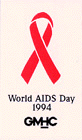 A color sticker with a red AIDS ribbon in the center with the words World AIDS Day; 1994; GMHC below it in black lettering.