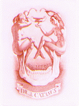 Bookplate for Ex Libris Dr. J. Catasus. It is a red colored lithograph of a skull with the words Ex Libris between the cranium and the mandible. The cranium is actually two naked women sitting on the mandible holding their arms up while holding snakes toward a bowl held by the woman on the right in the center of the cranium.
