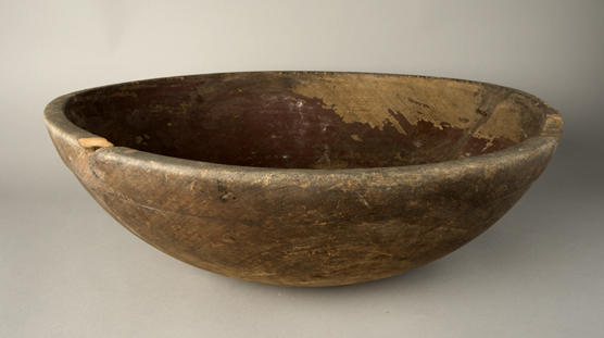 Wooden worn bowl.
