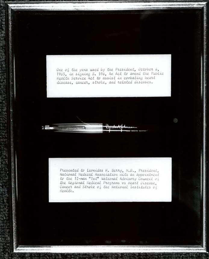 A plaque with one of the pens used by the President, October 6, 1965, in signing S. 596.