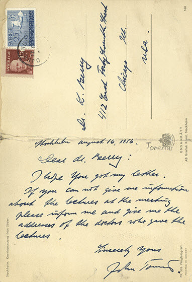 Postcard with handwritten text and stamps.