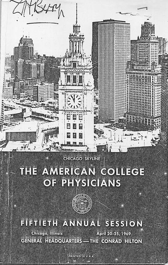 Front of brochure with typewritten text and city skyline background.