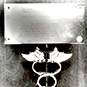 Plaque with medical symbol.