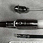Three instruments: oval shaped 
connected to a tube, wide long pointed shape connected to a tube, narrow shape connected to a tube.