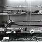 A display case showing name plates for Leonidas H. Berry,  scopes, and other medical instruments.