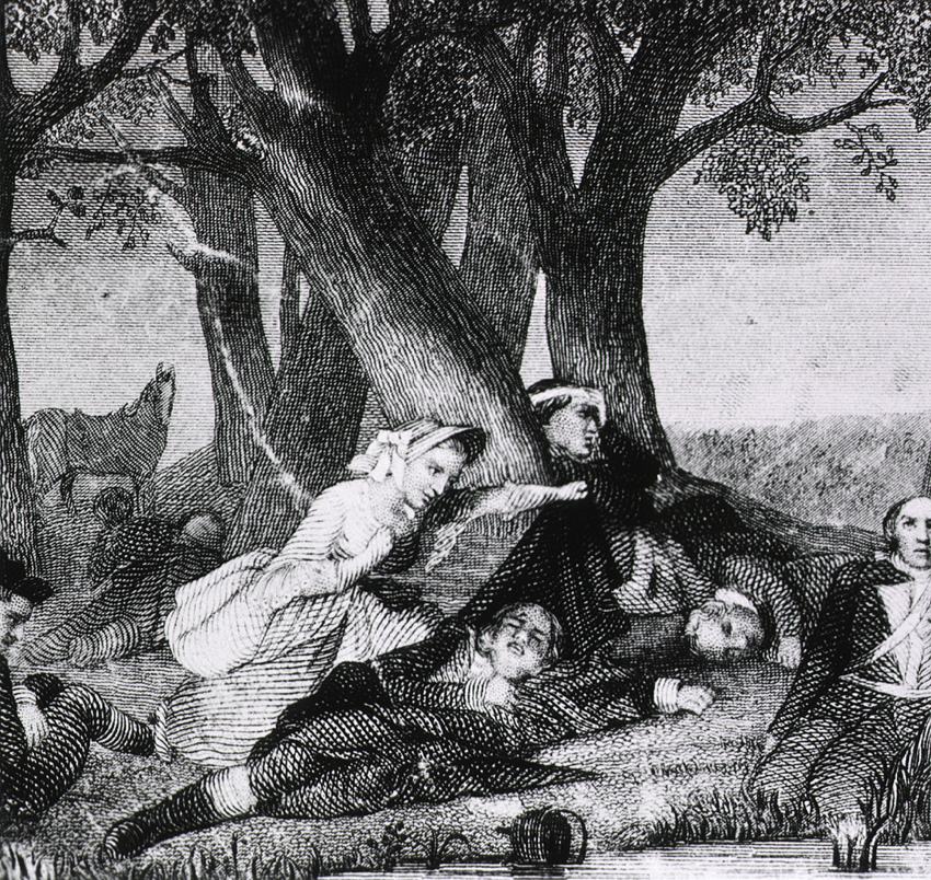 Nurse tends to injured soldiers on the ground at the base of a tree.