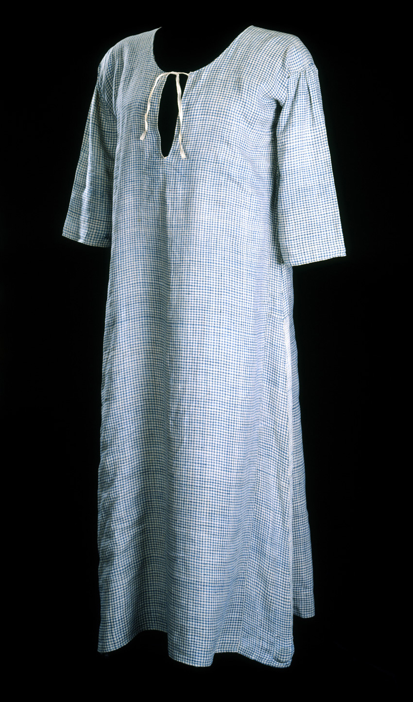 Blue and white printed bathing gown with strings to close slit at neck.