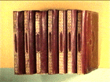 Examples of gilding on the binding of seven volumes in red leather.