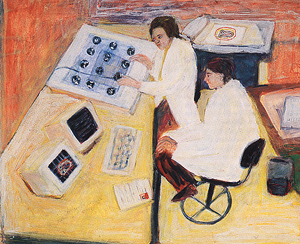 The physicist and a radiology resident are at the computer. The computerized axial tomography film is on a digitizing pad. 