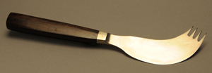A combination of a knife and fork with a wooden handle.