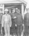 Seven Public Health Service officers in uniform standing outside at the Montauk Point, New York, Quarantine Station