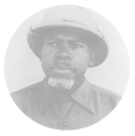 The head and shoulders full face view of  Senior Surgeon Hildrus A. Poindexter wearing a safari hat.
