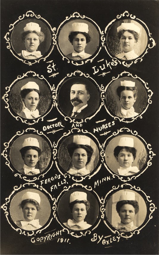 Twelve hospital staff, one White male doctor and eleven White female nurses.