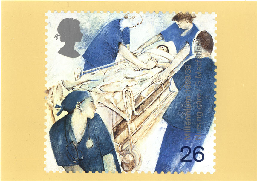 Three White females and one White male nurse, all in blue scrubs around a patient in a rolling bed.